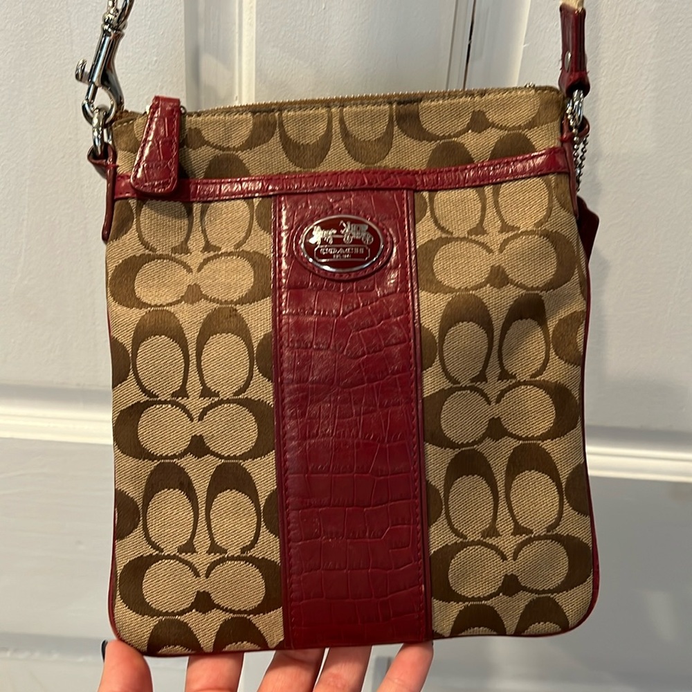 21. Coach Crossbody Purse